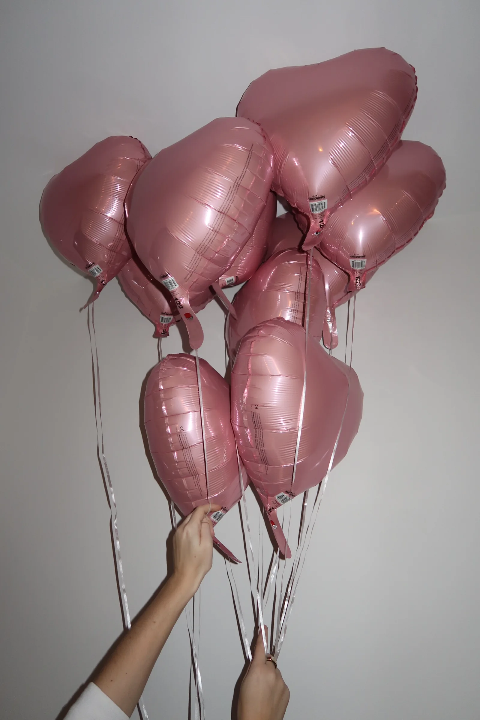 Pink heart-shaped balloons